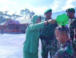 Komandan Kodim 1714/Puncak Jaya Pimpin Upacara Kenaikan Pangkat dan Korp Raport Pindah Satuan
